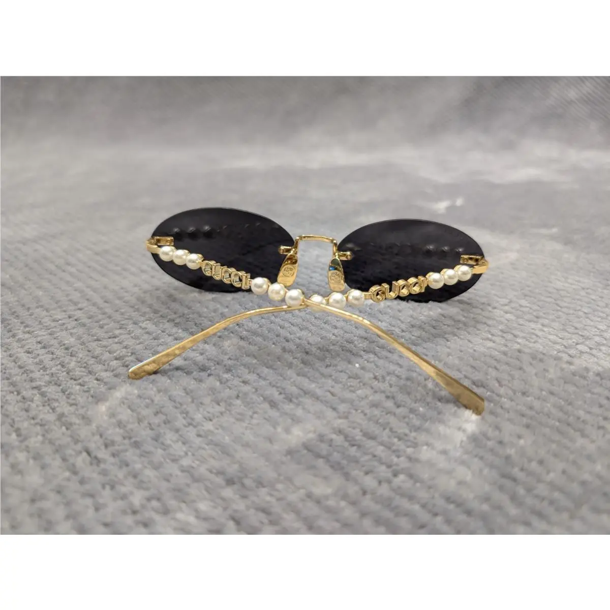 Gucci Sunglasses GG1922S Rimless Oval Gold Metal Frame Black Tinted