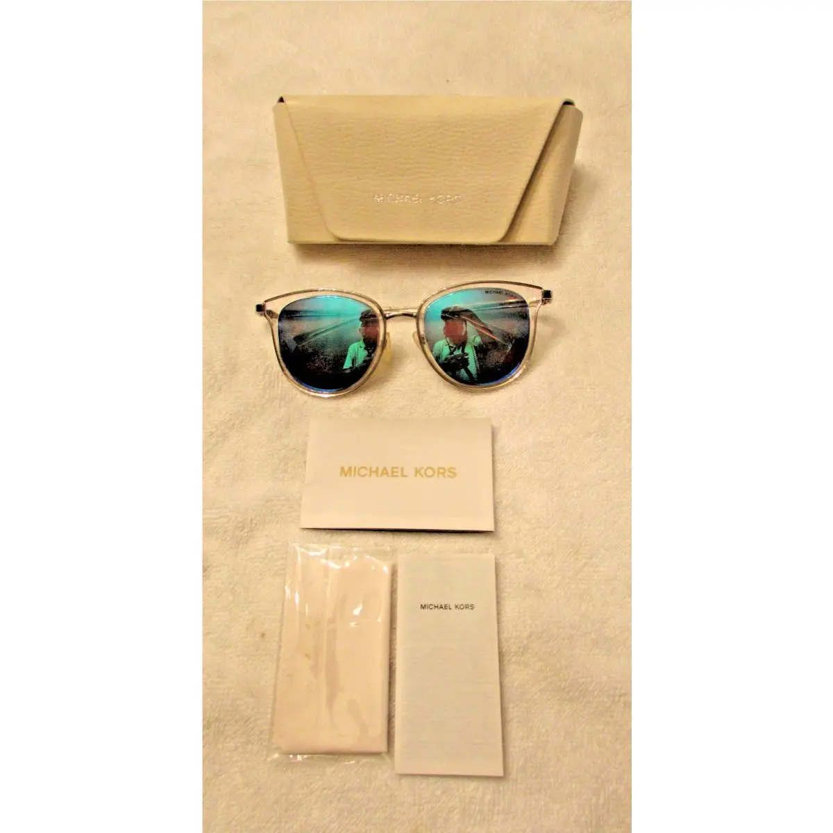 Michael Kors MK 1010 Adrianna I Sunglasses Women`s Clear Silver Mirror 54mm