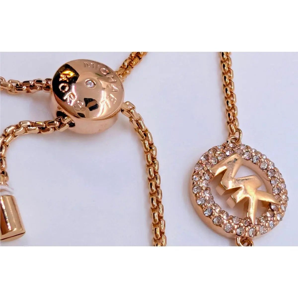Nice Michael Kors Gold Brass Logo Pave Crystal Charm Slider Adjustable Bracelet