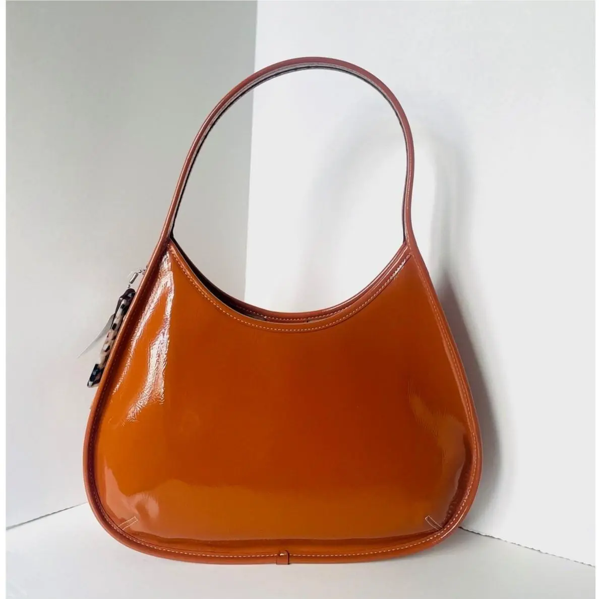 Coach Coachtopia Large Ergo Bag CQ019 Crinkle Patent Amber Leather