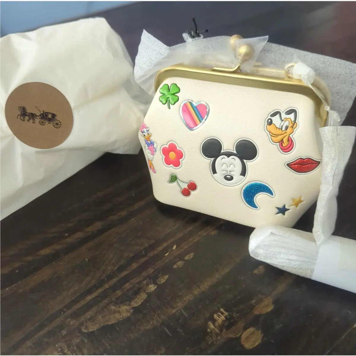 Disney X Coach Kisslock Frame Bag 10 with Sticker Print. CDO91