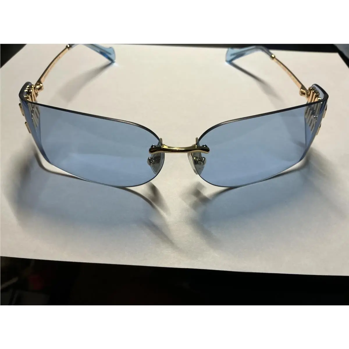Miu Miu MU A51S ZVN10P Gold Light Blue Lens Women Wrap Sunglasses