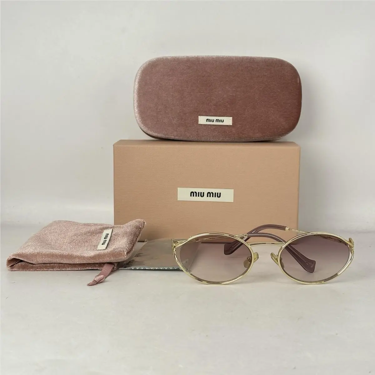 Miu Miu Womens Oval Thin Metal Gradient Sunglasses SMU52Y Gold/violet