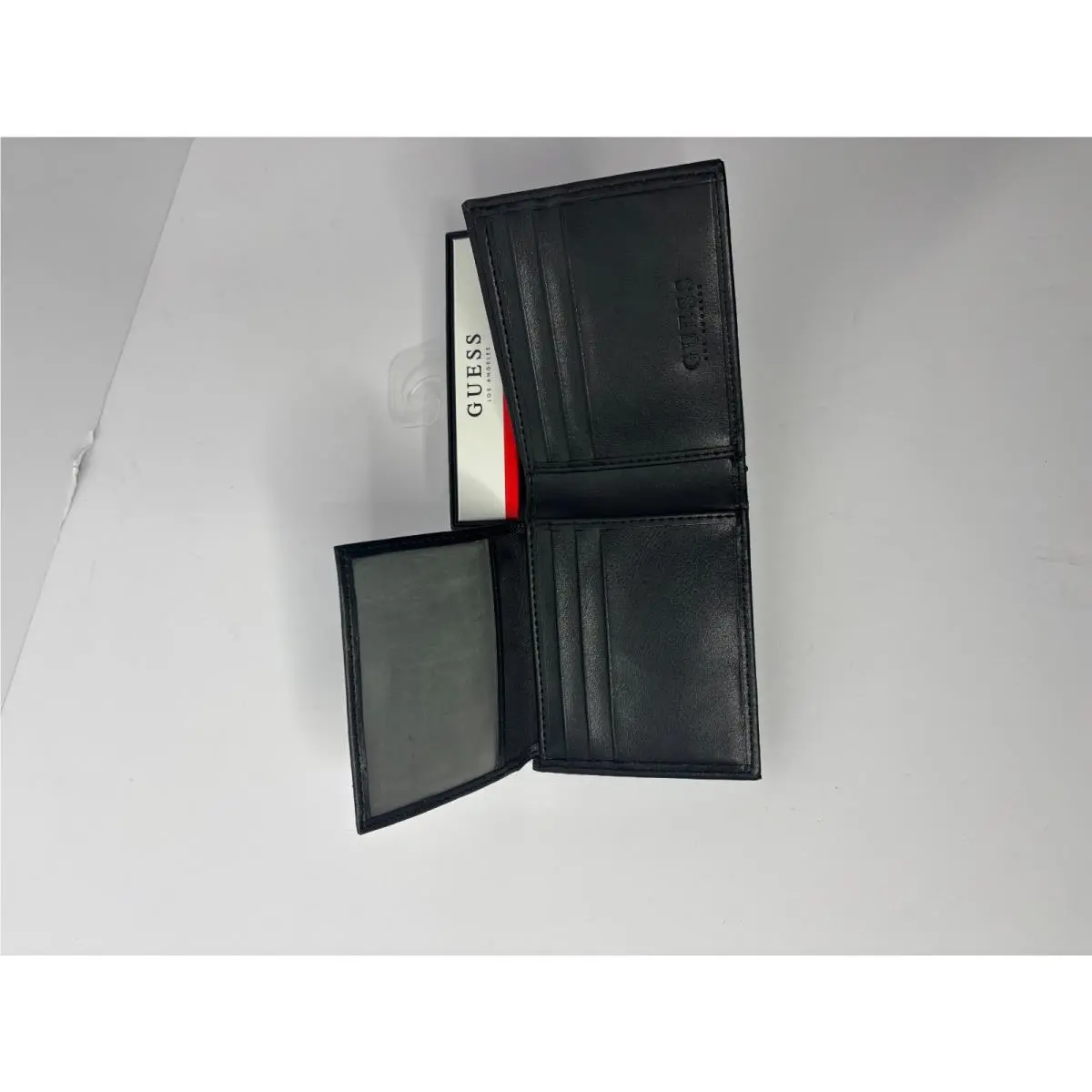 Guess Los Angeles Men`s Black Leather Tri-fold Wallet