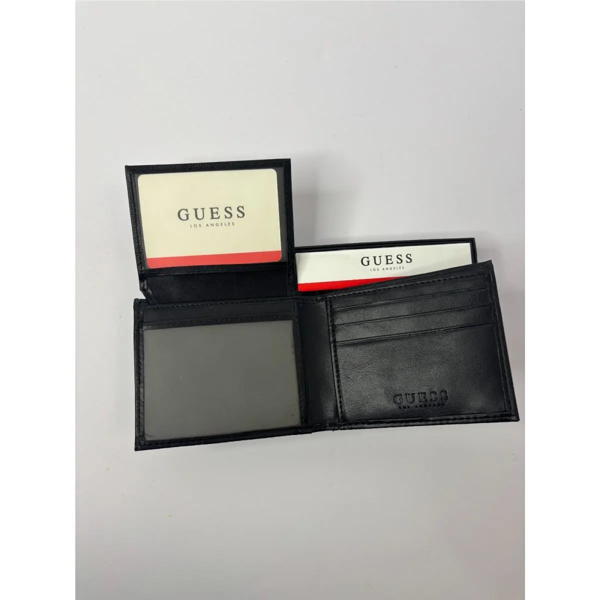 Guess Men`s Black Leather Tri-fold Wallet