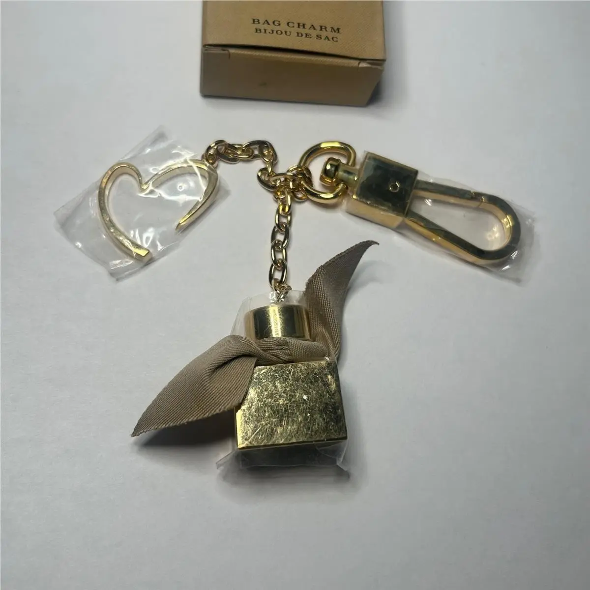 Burberry Gold Tone My Burberry Perfume Bottle Bag Charm Heart Keychain 4040619