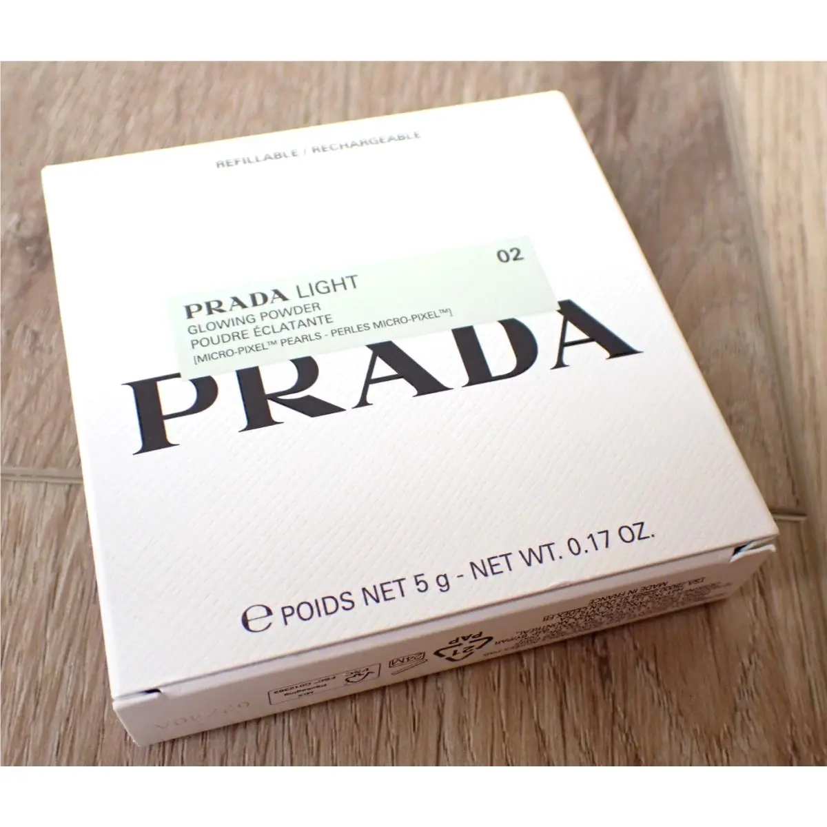 Light 02 Glowing Powder .17 OZ Champagne Long Wear Foundation by Prada