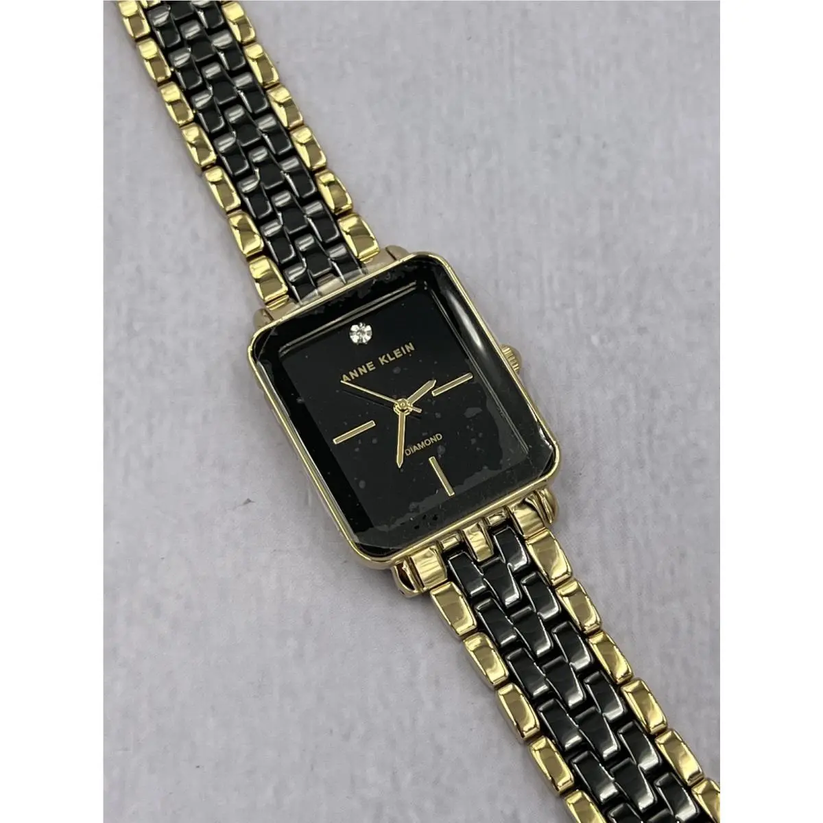 AK/3668BKGB Women`s Gold Case Black Dial Metal Bracelet Analog Watch by Anne Klein