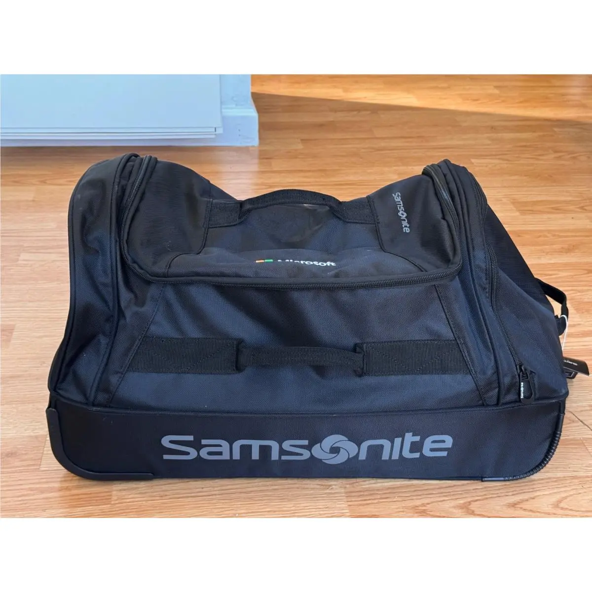 Andante 2 Wheeled Rolling Duffel Bag 22 Black by Samsonite