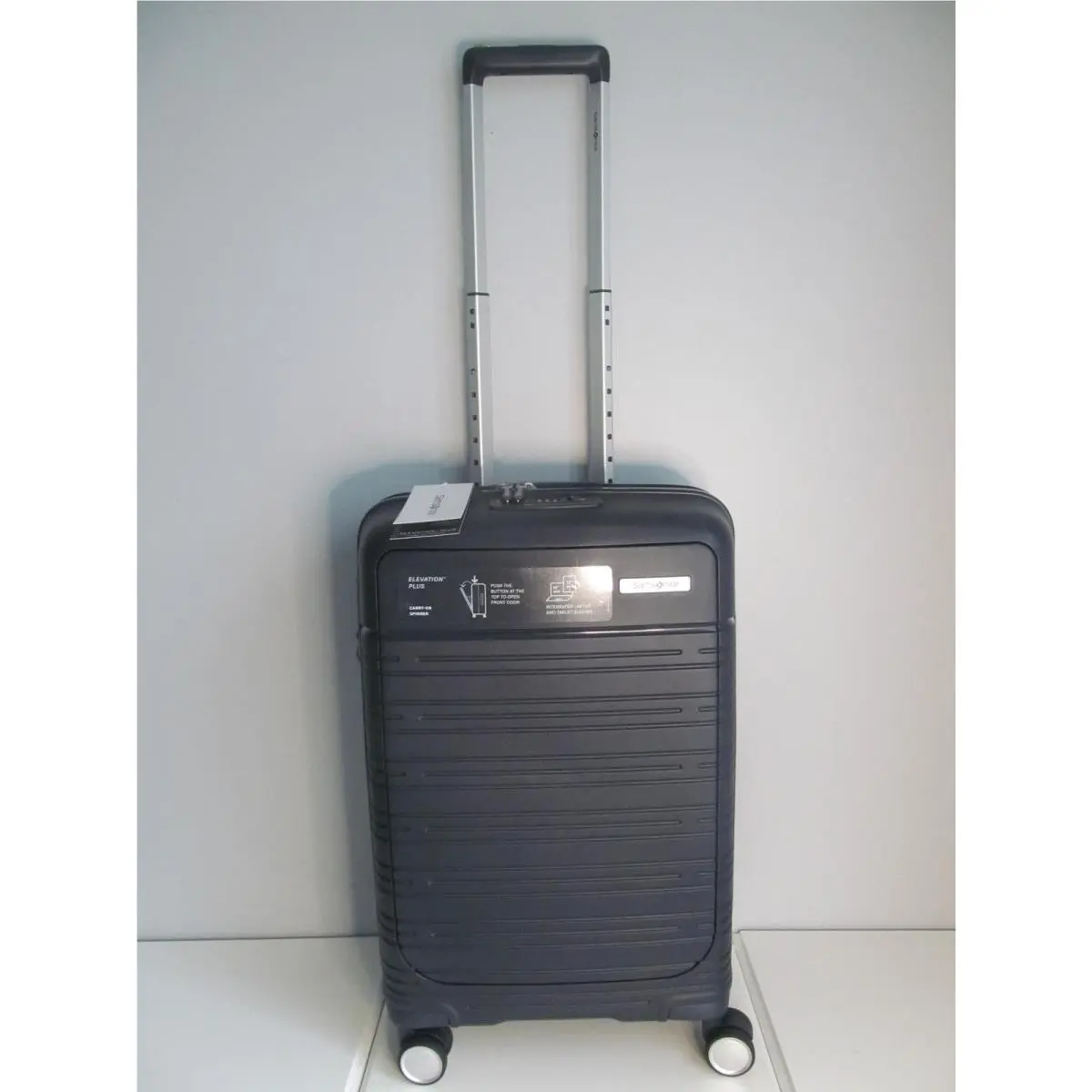 2026 Navy Elevation Plus Fast Entry Tech Pocket Carry-on Spinner by Samsonite