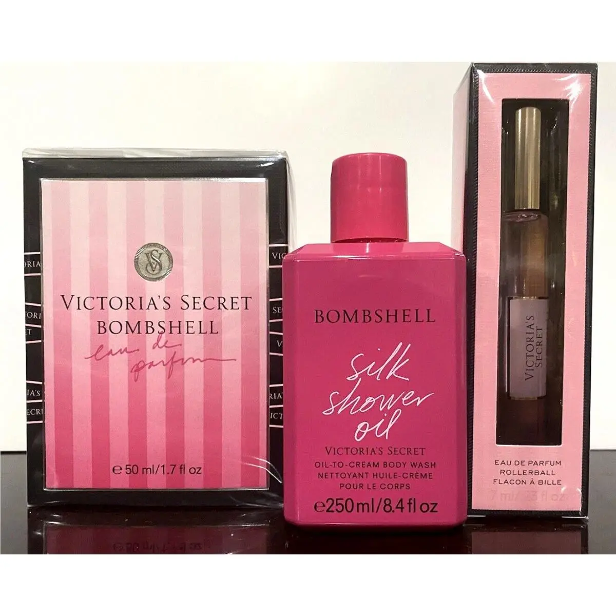 Victoria`s Secret Lot OF 3 Bombshell Silk Shower Oil Perfume Rollerball Set