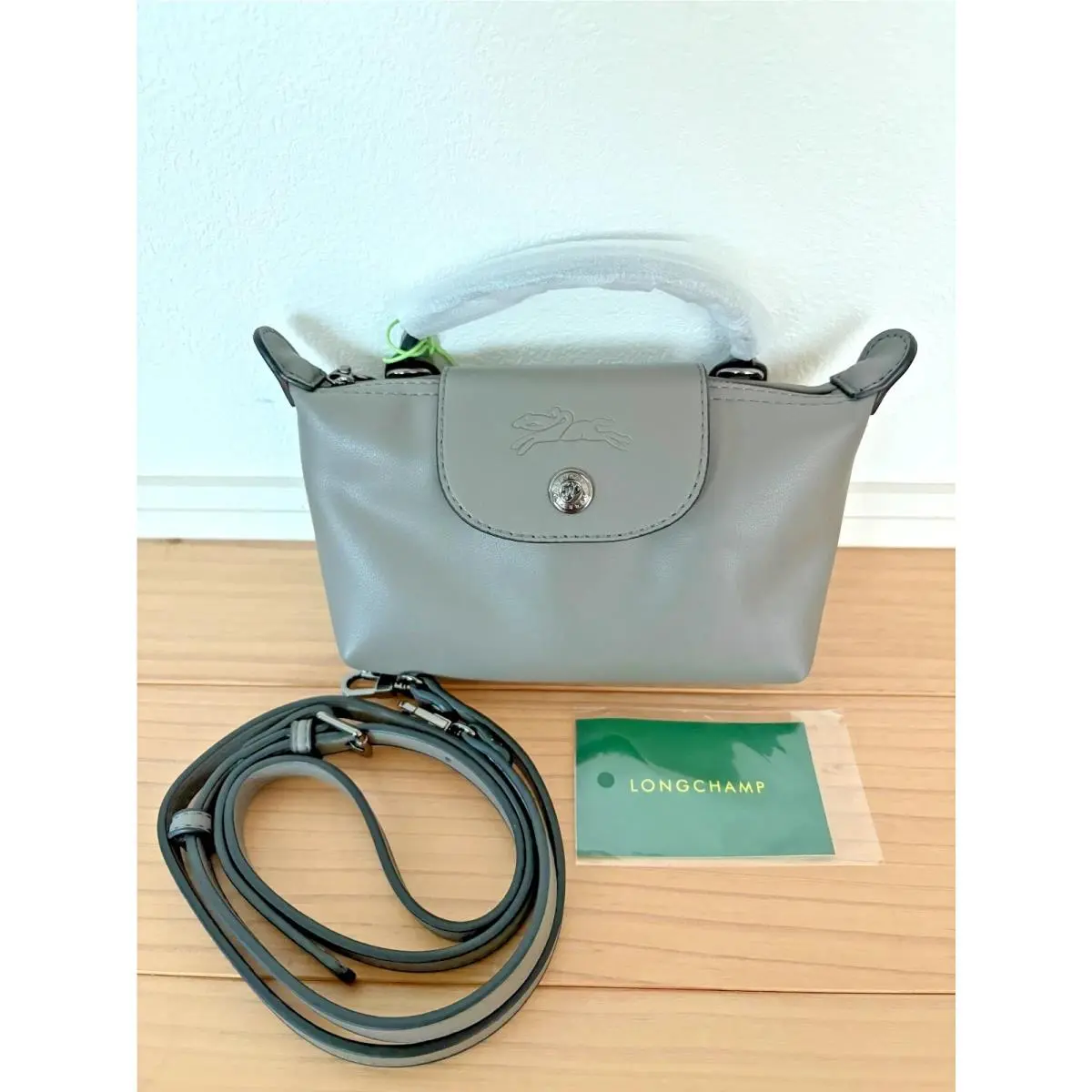 Extra Small Le Pliage Xtra Leather Top Handle Bag by Longchamp