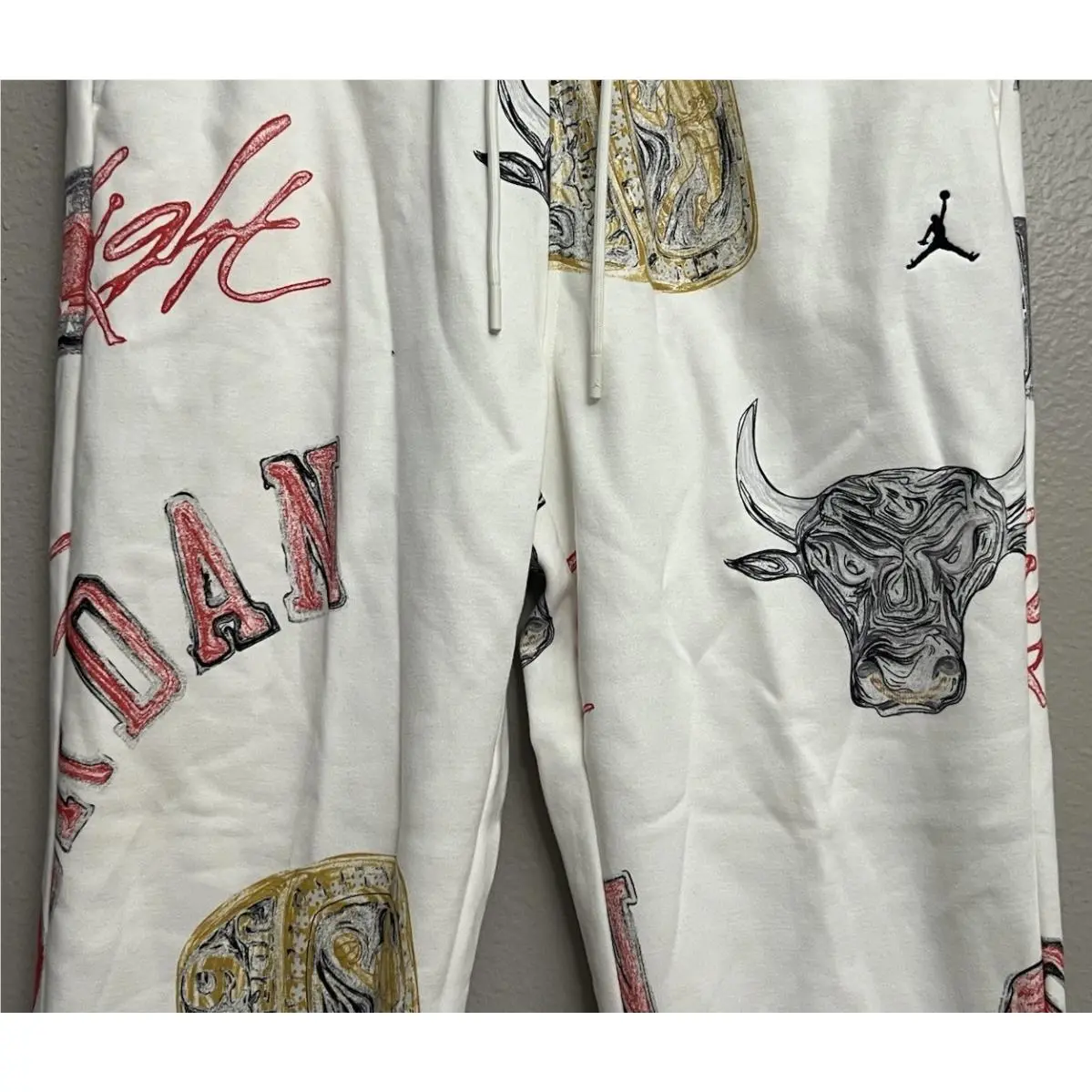 Nike clothing - Nike Air Jordan Brooklyn Fleece Pants - FN4547-133 - Sail (UPC: 196976105815) 1