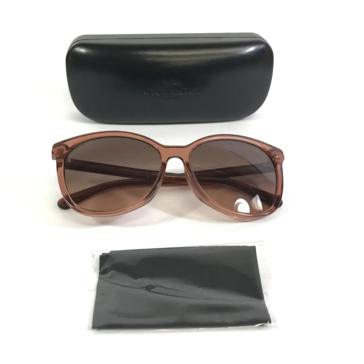 Sunglasses HC8271U L1101 5662G9 Transparent Amber w/ Gradient Brown Lenses by Coach