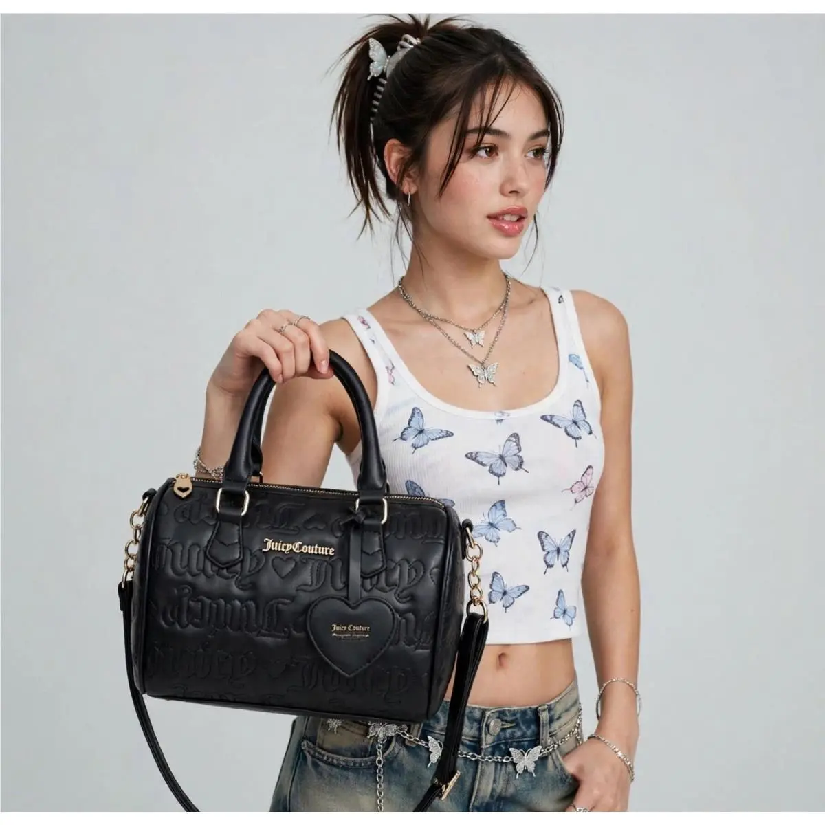 s Fame Satchel Liquorice /black by Juicy Couture