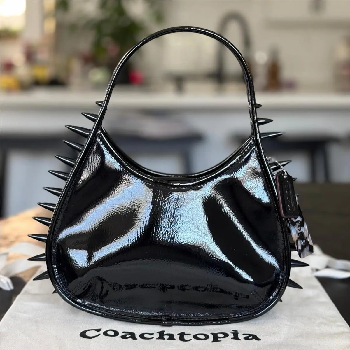 Ergo Bag In Crinkle Patent topia Leather with Spikes Style CY303 by Coach