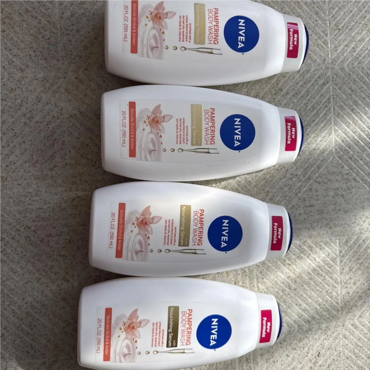4 Pack  Pampering Body Wash Delicate Orchid Amber 20 fl oz Each by Nivea