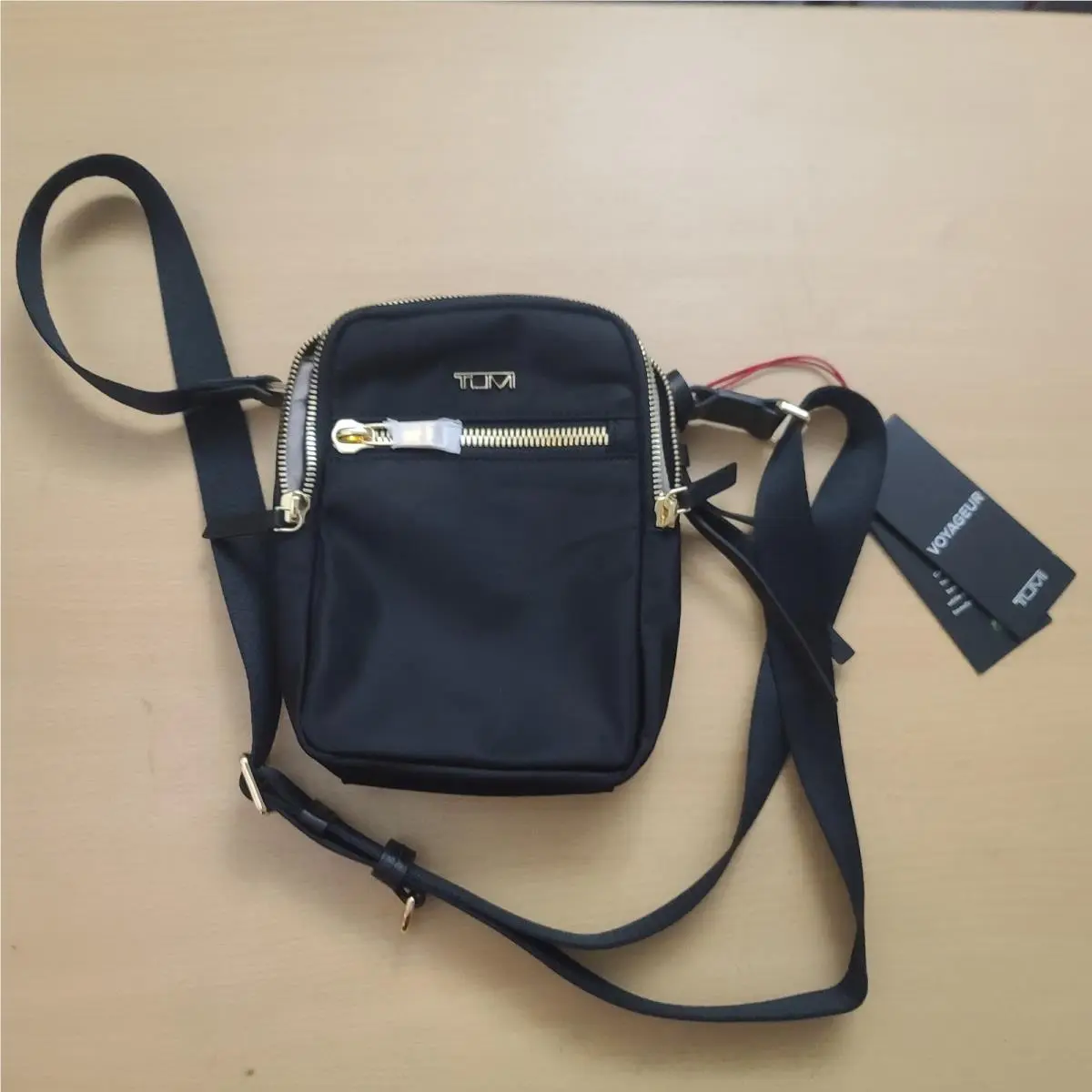 Voyageur Persia Crossbody Black Gold Adjustable 146579-2693 by Tumi