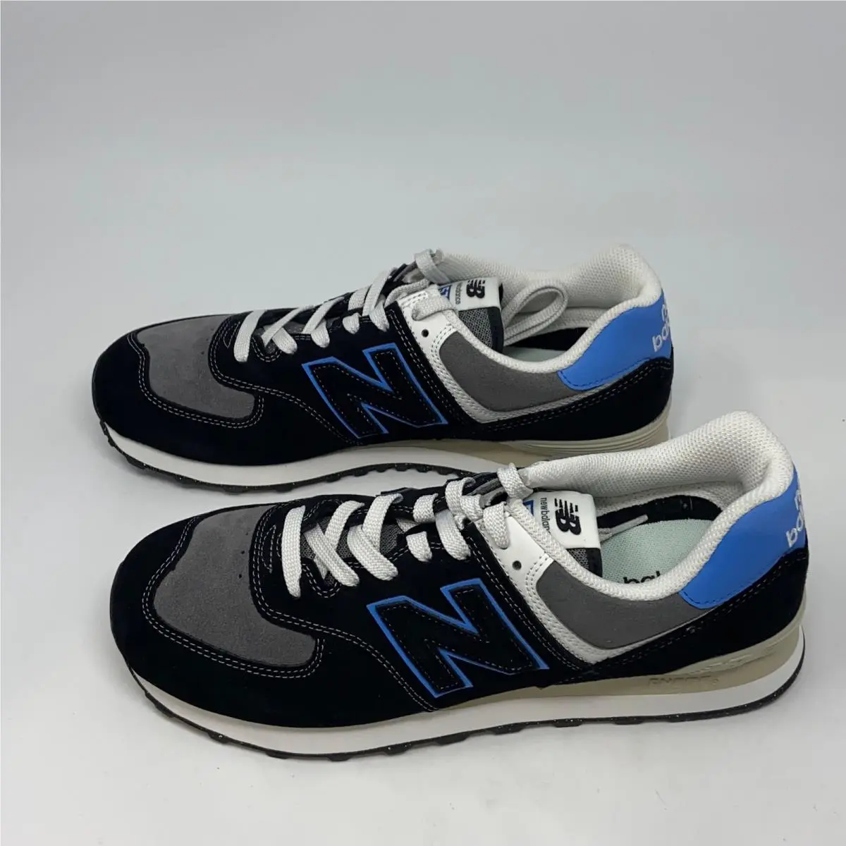 574 Black/blue Men’s 12.5 D Sneakers by New Balance