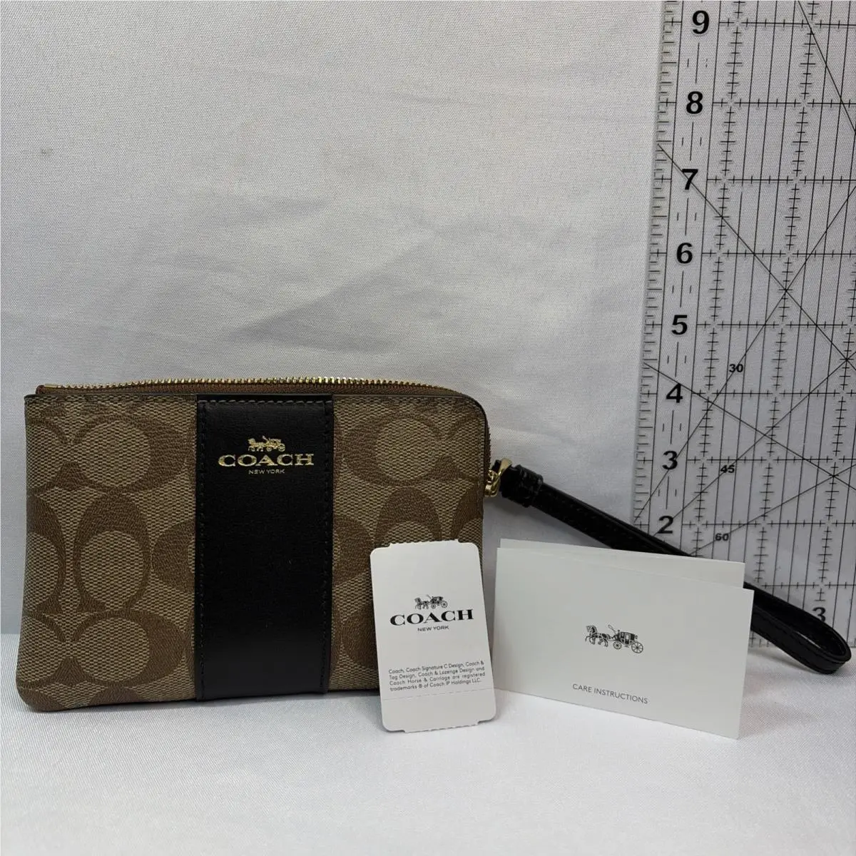 Signature Logo Corner Zip Wristlet Pouch Brown/black Gold Hardware by Coach