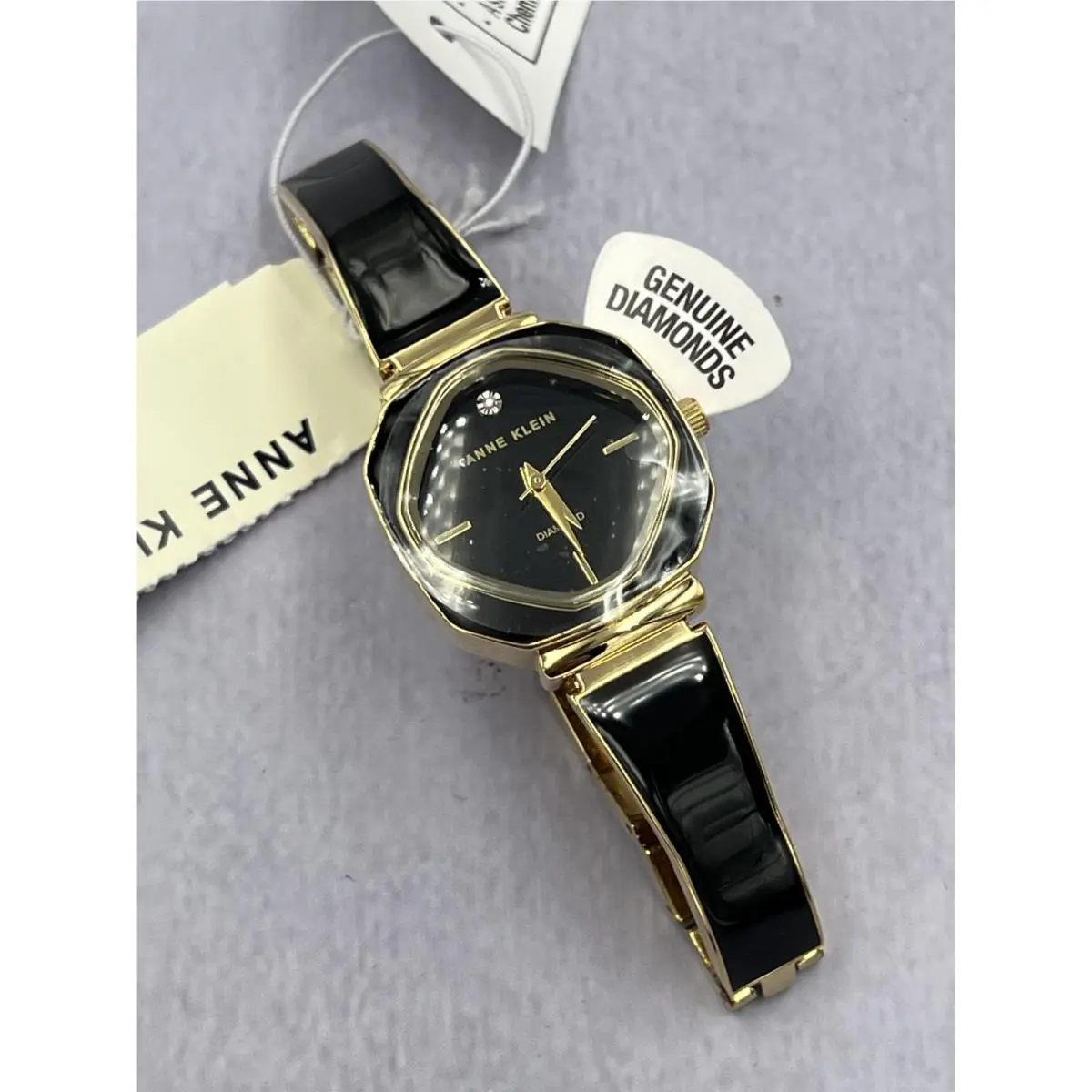 AK/5402GPBK Women`s Diamond Accented Gold Case Analog Bracelet Watch by Anne Klein