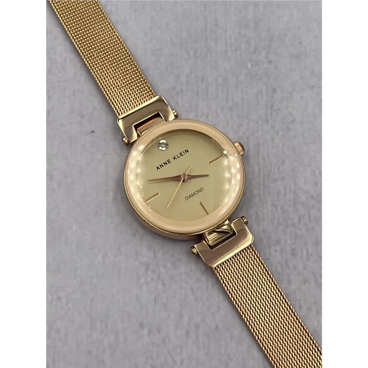 AK/3034 Women`s Diamond Accented Rose Gold Mesh Bracelet Analog Watch by Anne Klein