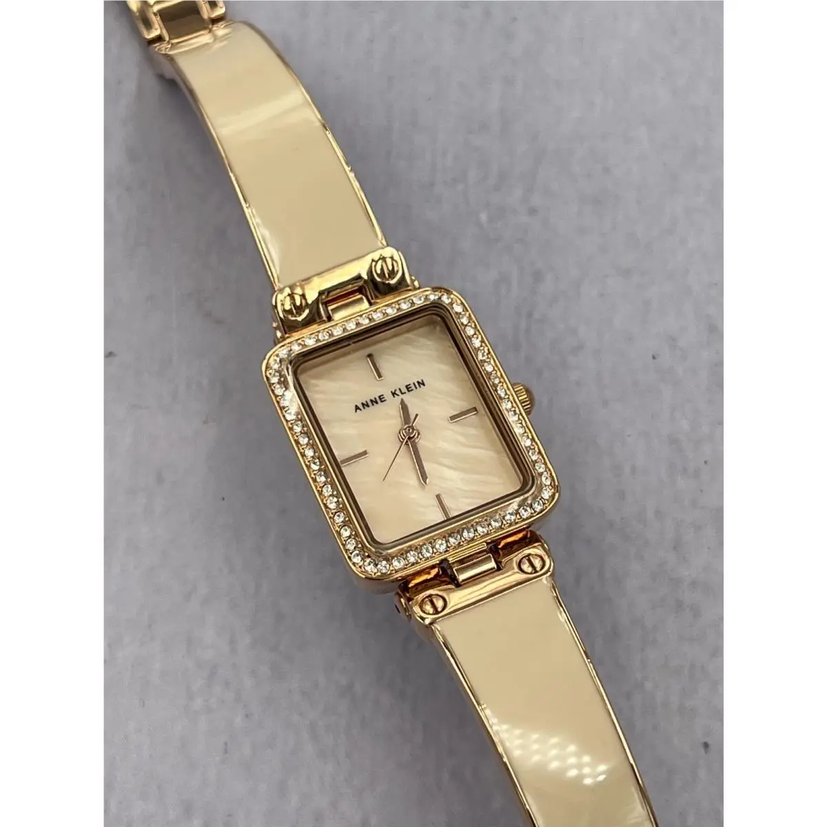 AK/3898G Women`s Diamond Accented Rose Gold Dial Case Analog Watch by Anne Klein