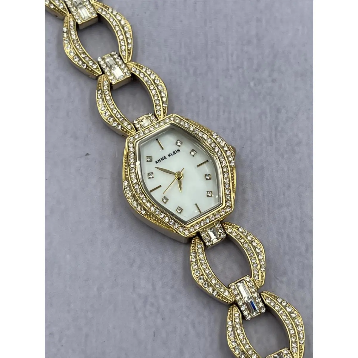 AK/4020GBST Women`s Diamond Accented Mop Dial Analog Bracelet Watch by Anne Klein