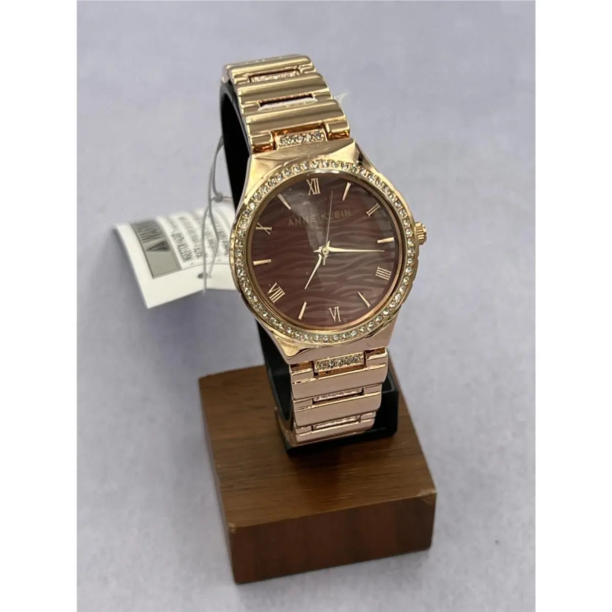 AK/4050 Women`s Diamond Accented Rose Gold Case Analog Bracelet Watch by Anne Klein