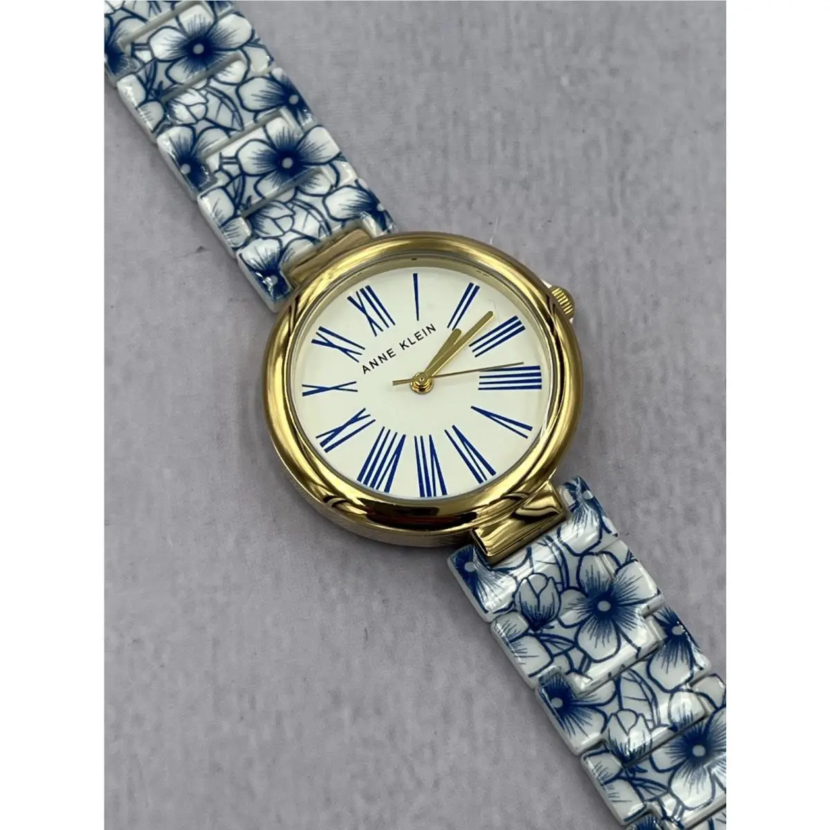 AK/5320GPBL Women`s Mop Dial Gold Case Floral Analog Bracelet Watch by Anne Klein