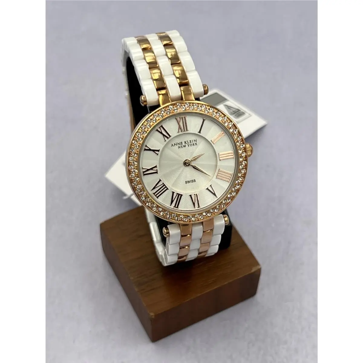 12/2262RGWT Women`s Diamond Accented White Dial Analog Bracelet Watch by Anne Klein