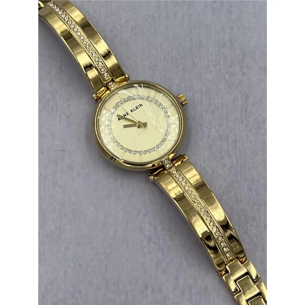 AK/3248 Women`s Diamond Accented Gold Dial Case Analog Watch by Anne Klein