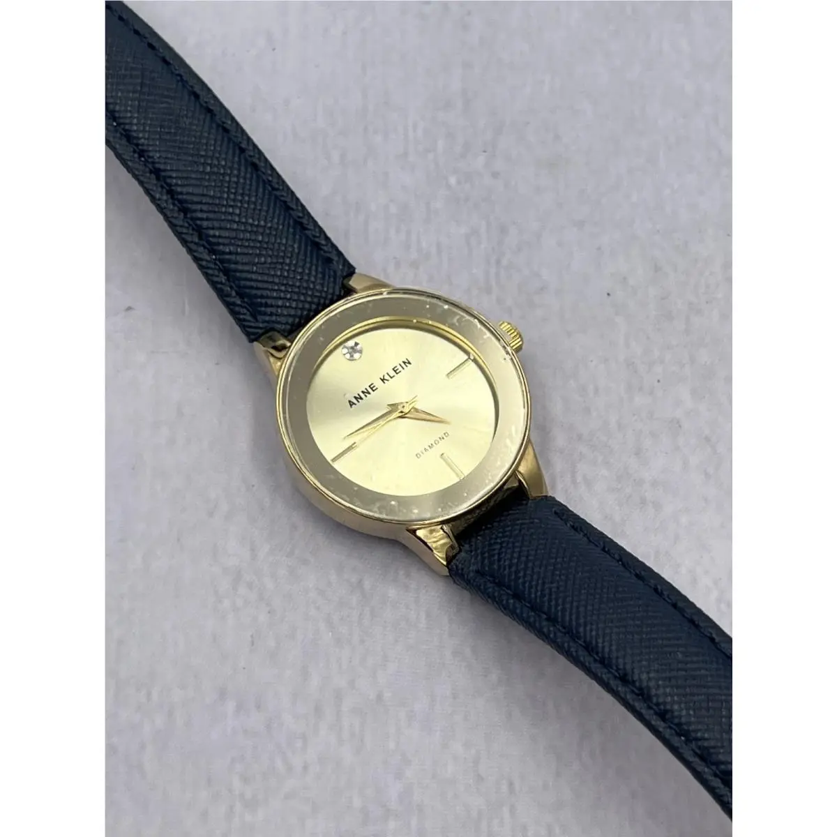 AK/2538 Women`s Diamond Accented Gold Dial Case Analog Watch by Anne Klein