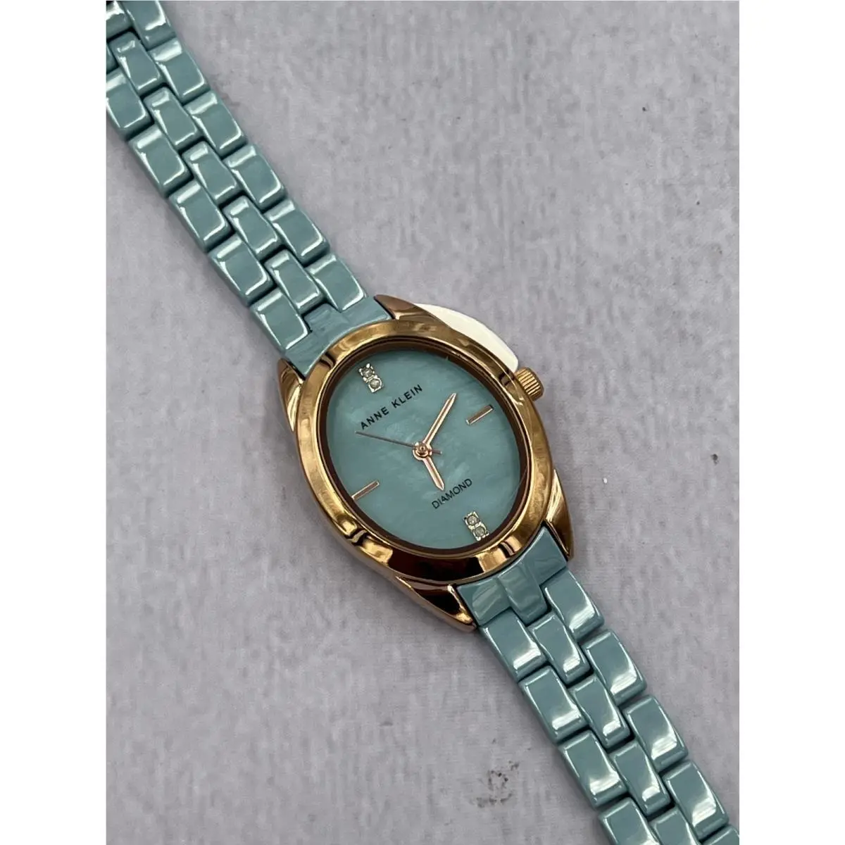 AK/5182AQRG Women`s Diamond Accented Blue Mop Dial Analog Watch by Anne Klein