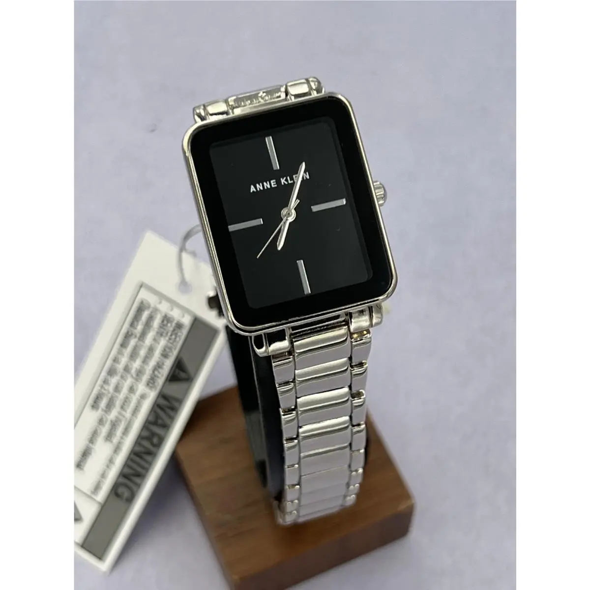 AK/3647BKSV Women`s Black Dial Silver Case Analog Bracelet Watch by Anne Klein