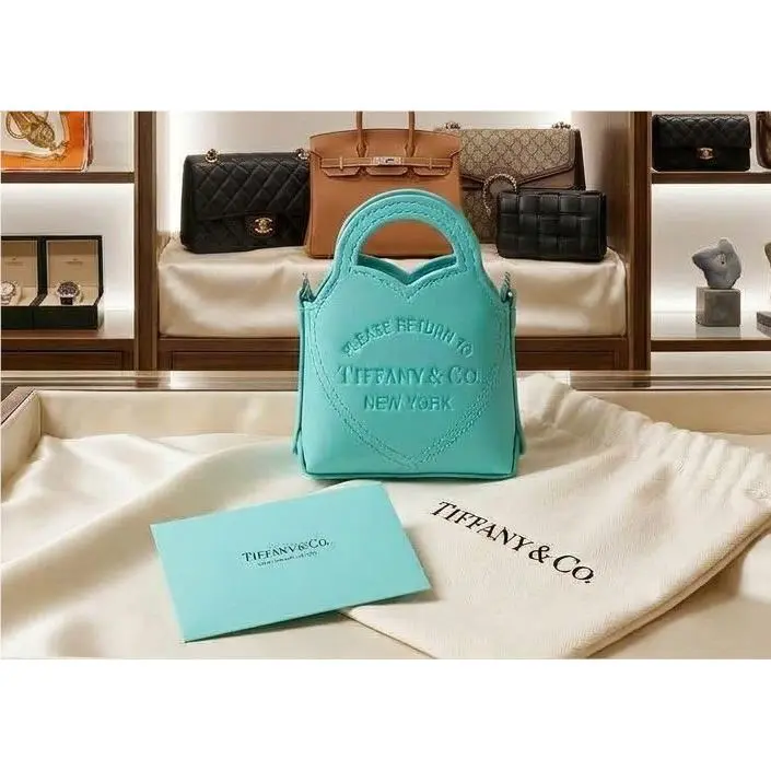 Tiffany Co. Return To Tiffany Blue Mini Nano Micro Charm Bag by Tiffany & Co.
