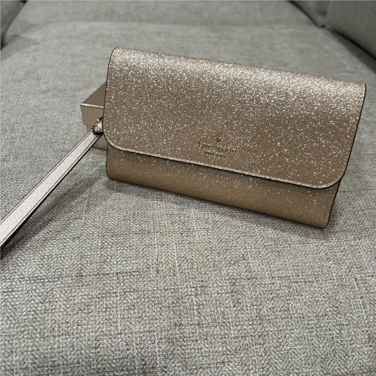 Medium Boxed Glitter Flap Phone Wristlet In Gold by Kate Spade