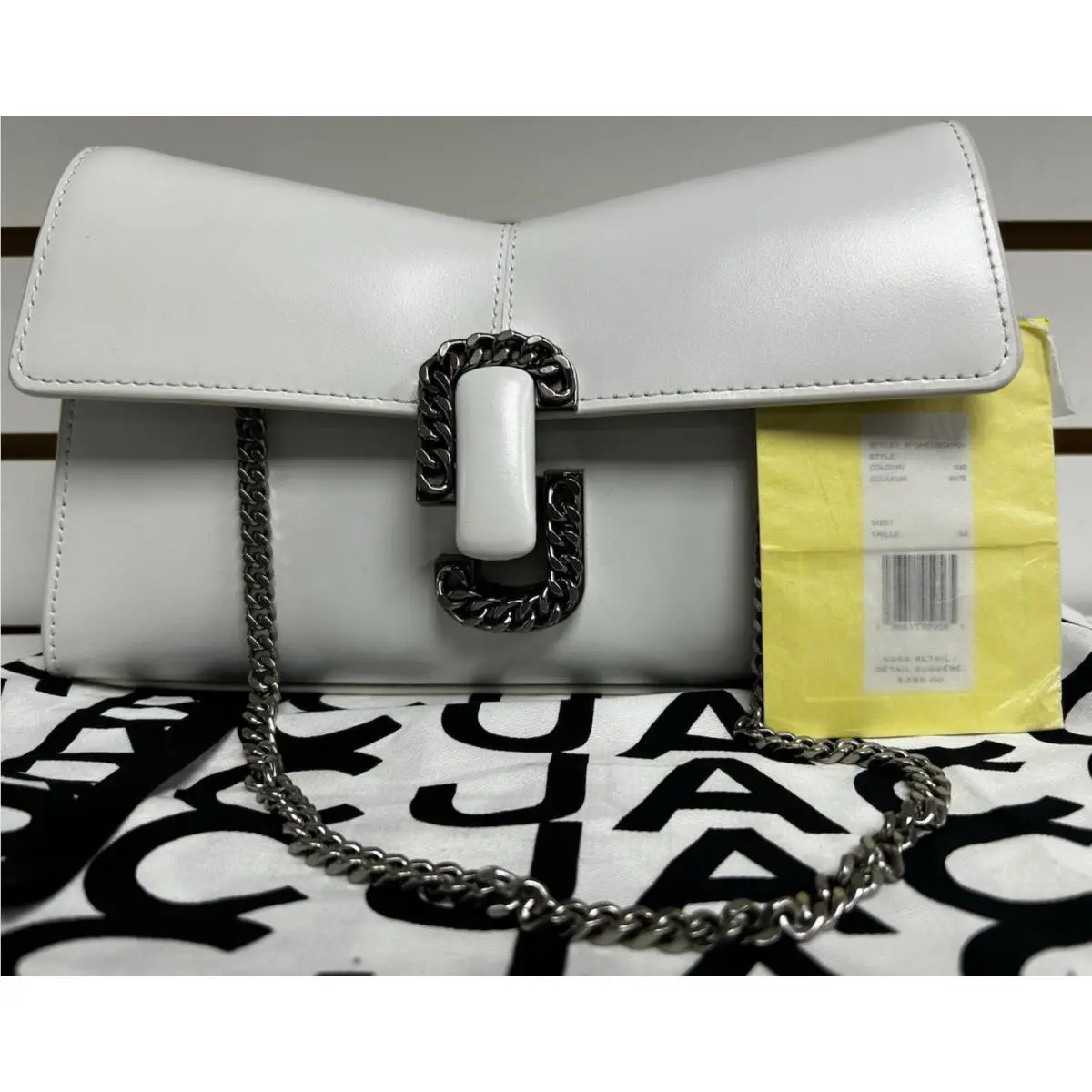 The St. Marc True White Leather Chain Clutch Bag by Marc Jacobs