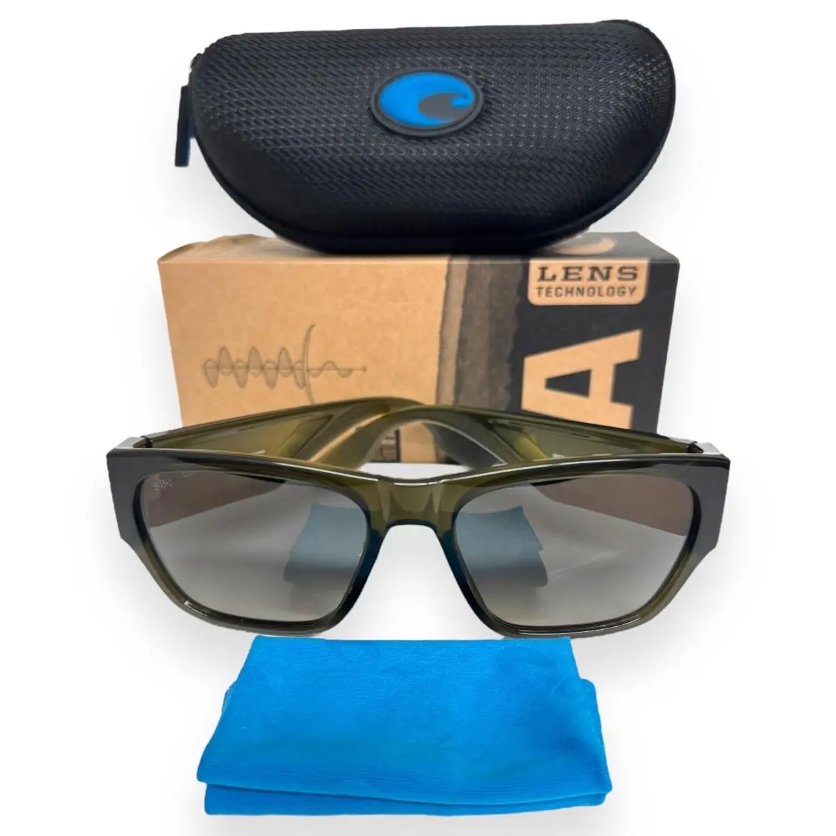 Sunglasses Suenos Translucent Green Polarized Glass Lens with Case by Costa Del Mar